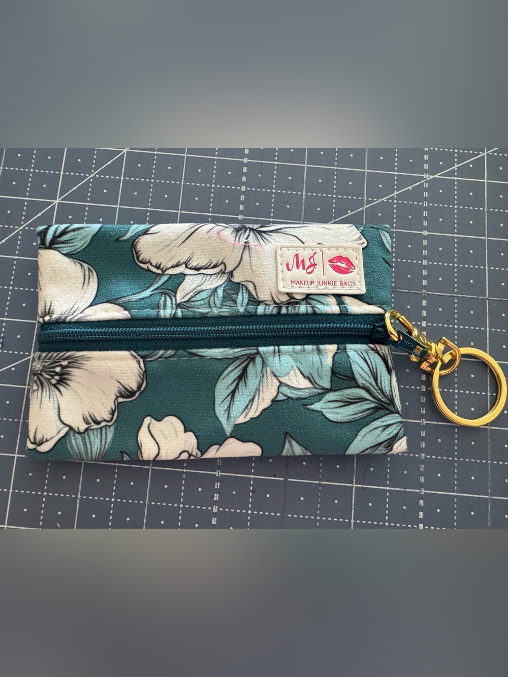 Makeup Junkie small zipper pouch with keychain. BRAND NEW!